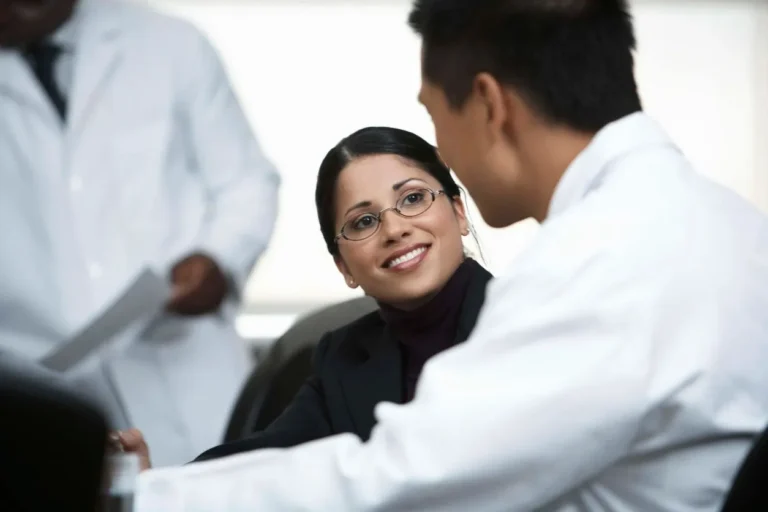 Dentist examining a patient's gums for signs of gum disease